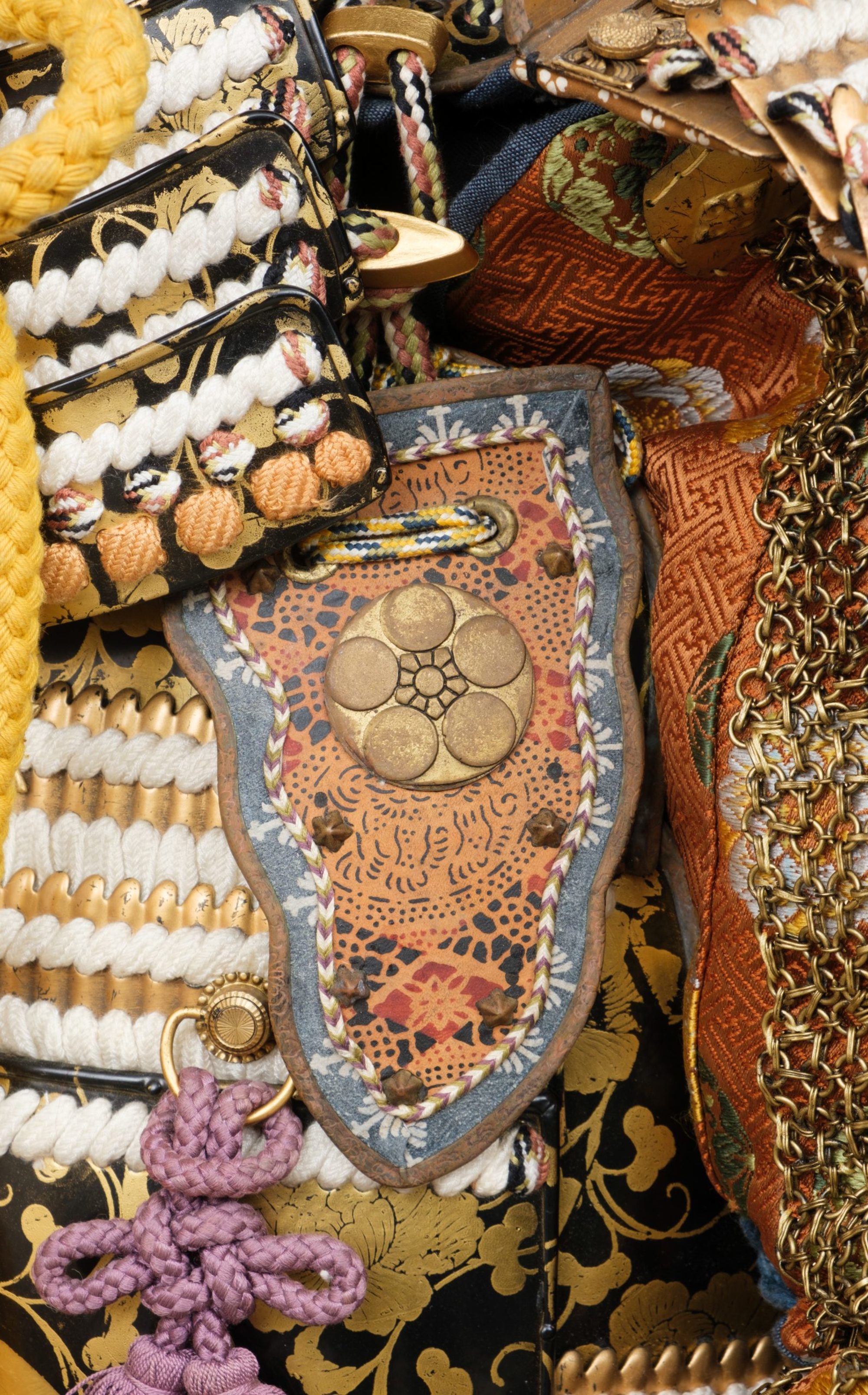 A JAPANESE GOLD AND BLACK LACQUERED 'GREAT SUIT-OF-ARMOUR