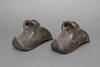 A PAIR OF SPANISH “SHOE-SHAPE” BRONZE CONQUISTADOR HORSE STIRRUPS, 1860s