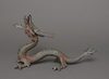 A JAPANESE CAST-IRON OKIMONO DRAGON, MID 20TH CENTURY
