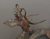 A JAPANESE CAST-IRON OKIMONO DRAGON, MID 20TH CENTURY
