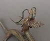 A JAPANESE CAST-IRON OKIMONO DRAGON, MID 20TH CENTURY