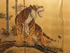 A TALL JAPANESE  SIX-PANEL TIGER SCREEN, EARLY-MID 20TH CENTURY