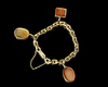 A GOLD BRACELET SET WITH THREE QAJAR AGATE SEALS, 19TH CENTURY