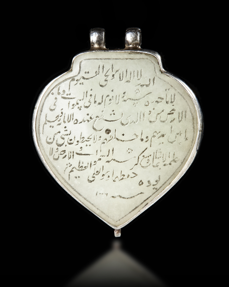 A MUGHAL CALLIGRAPHIC JADE PENDANT (HALDILI), INDIA, DATED 1006 AH/ 1598 AD