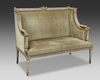 A FRENCH CARVED AND GRAY LACQUERED WOODEN SOFA, LOUIS XVI STYLE, LATE 19TH CENTURY