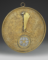 A QAJAR BRASS QIBLA INDICATOR, 19TH CENTURY
