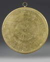 A QAJAR BRASS QIBLA INDICATOR, 19TH CENTURY
