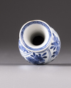 A small blue and white Kangxi vase