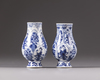 Two small blue and white Kangxi vases