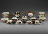 A COLLECTION OF 19 CHINESE FAMILLE ROSE CAFE AU LAIT GROUND ' BATAVIA' WARES, 18TH CENTURY