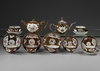 A COLLECTION OF 19 CHINESE FAMILLE ROSE CAFE AU LAIT GROUND ' BATAVIA' WARES, 18TH CENTURY