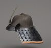 A JAPANESE SUJI’BACHI KABUTO WITH BRONZE MAEDATE, SECOND HALF 19TH CENTURY