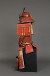 A RED LACQUER JAPANESE SUIT-OF-ARMOUR BY SATSUMA KUNIZUMI, 11TH GENERATION MITSUNOBU, MID 20TH CENTURY