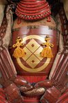 A RED LACQUER JAPANESE SUIT-OF-ARMOUR BY SATSUMA KUNIZUMI, 11TH GENERATION MITSUNOBU, MID 20TH CENTURY