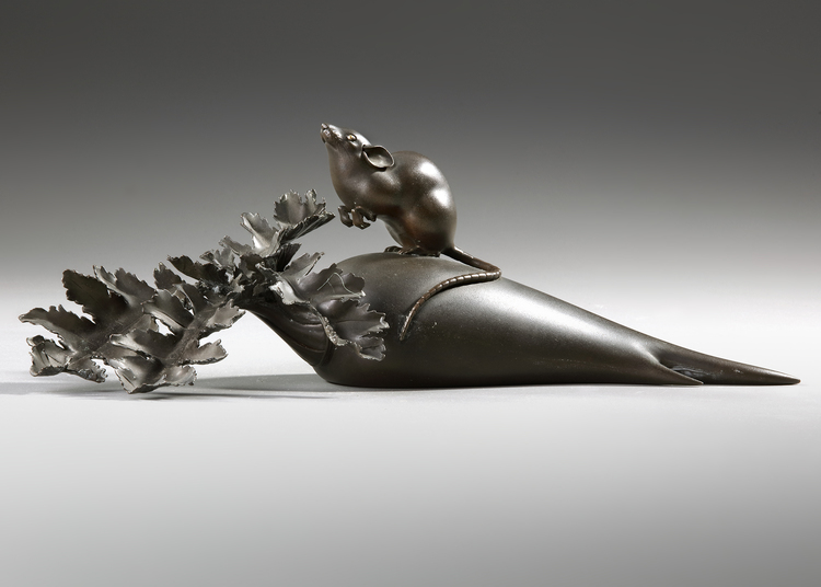 A DARK BRONZE OKIMONO SHOWING A LARGE MOUSE ON A DAIKON RADISH, EARLY 20TH CENTURY