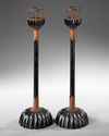 A JAPANESE PAIR OF BLACK LACQUERED CANDLESTICKS, MEIJI PERIOD (1868-1912)