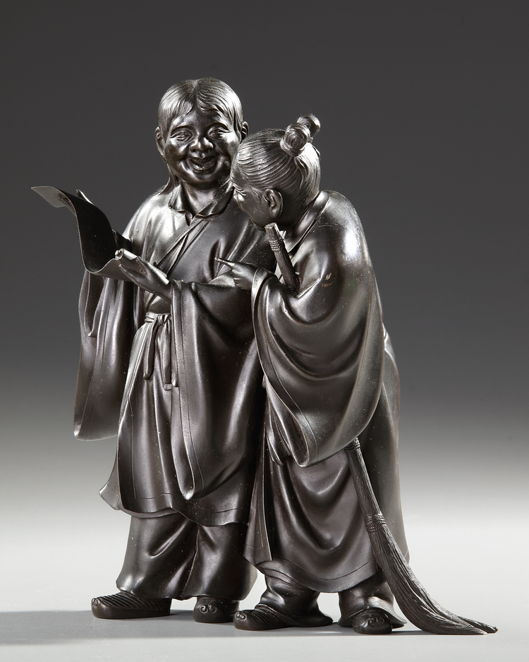 A FINE JAPANESE BRONZE OBJECT 置物 DEPICTING KANZAN 寒山 (HANSHAN) AND JITTOKU 拾得 (SHIDE), MEIJI PERIOD (1868-1912)