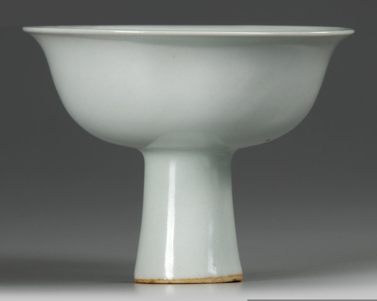 A CHINESE SHUFU MOULDED 'DRAGON' STEM BOWL, YUAN DYNASTY (1279-1368)