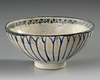 A KASHAN POTTERY BOWL, PERSIA, EARLY 13TH CENTURY
