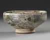 A SGRAFFITO SPLASHWARE POTTERY BOWL,  PERSIA, NISHAPUR, 10TH CENTURY