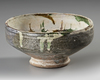 A SGRAFFITO SPLASHWARE POTTERY BOWL,  PERSIA, NISHAPUR, 10TH CENTURY