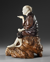 A LARGE JAPANESE BRONZE AND IVORY OKIMONO OF A PIPE SMOKER, MEIJI PERIOD (1868-1912)