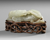 A CHINESE GRAYISH JADE CARVING OF A HORSE, 19TH CENTURY