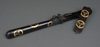 A BLACK LACQUERED QUIVER