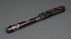 A BLACK LACQUERED QUIVER