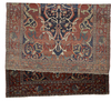 AN ANTIQUE HERIZ BAKSHAISH RUG