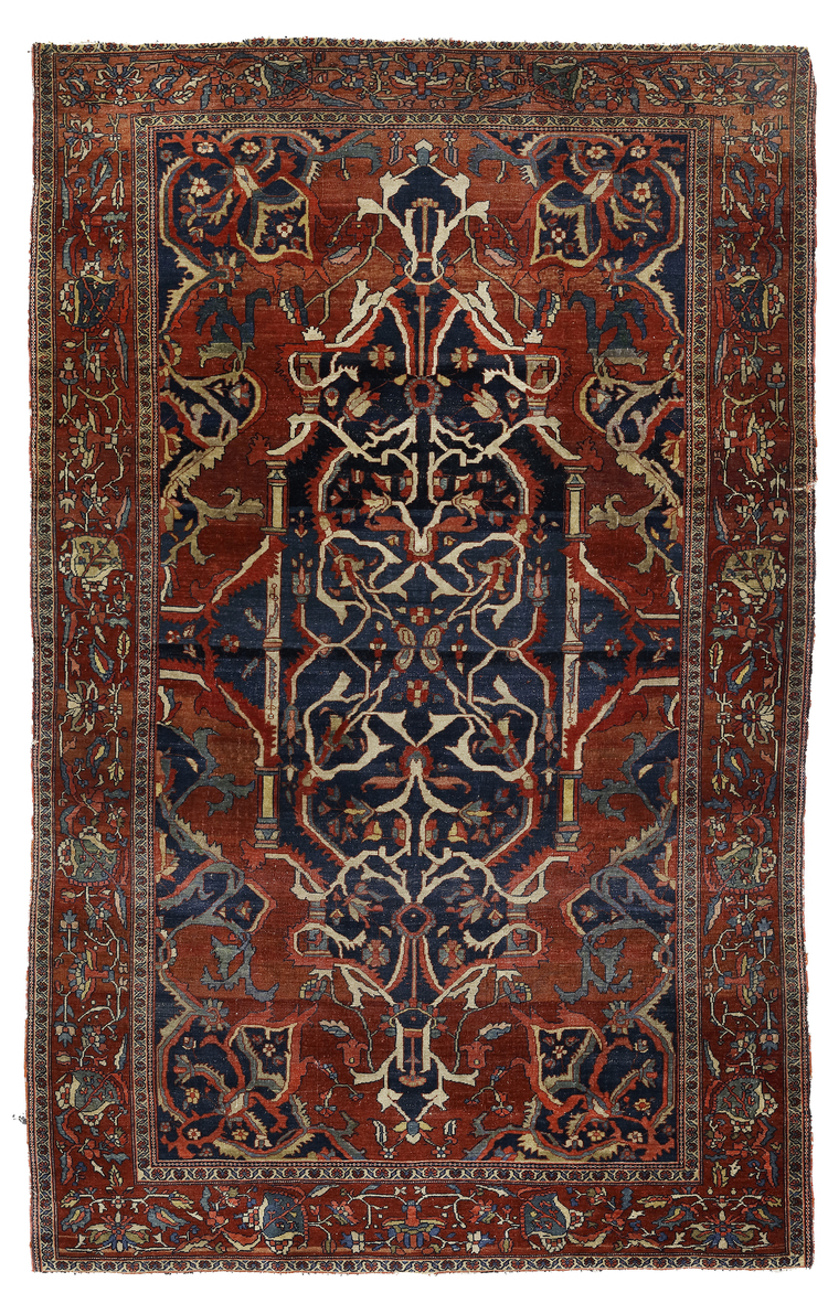 AN ANTIQUE HERIZ BAKSHAISH RUG