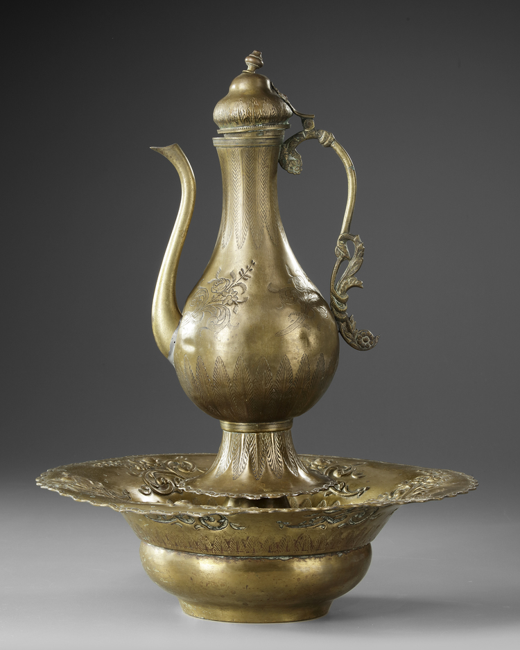 AN OTTOMAN BRASS EWER AND BASIN, 18TH CENTURY