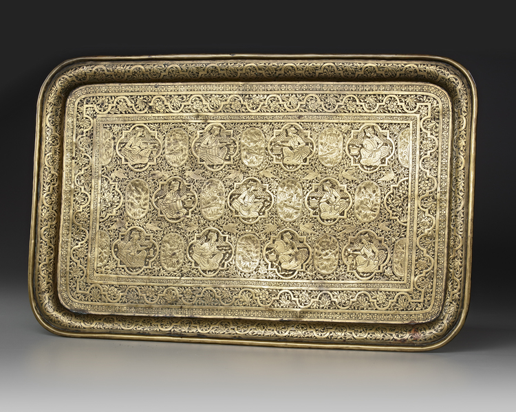 A QAJAR ENGRAVED BRASS TRAY, PERSIA, 19TH CENTURY