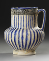 A KASHAN POTTERY JUG, PERSIA,  11TH-12TH CENTURY