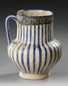 A KASHAN POTTERY JUG, PERSIA,  11TH-12TH CENTURY