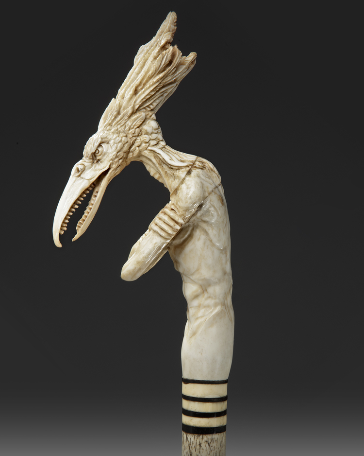 A BONE CARVED WALKING CANE