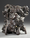 A CHINESE CARVED BONE FIGURE OF A BUDDHA WITH A CARVED WOODEN STAND