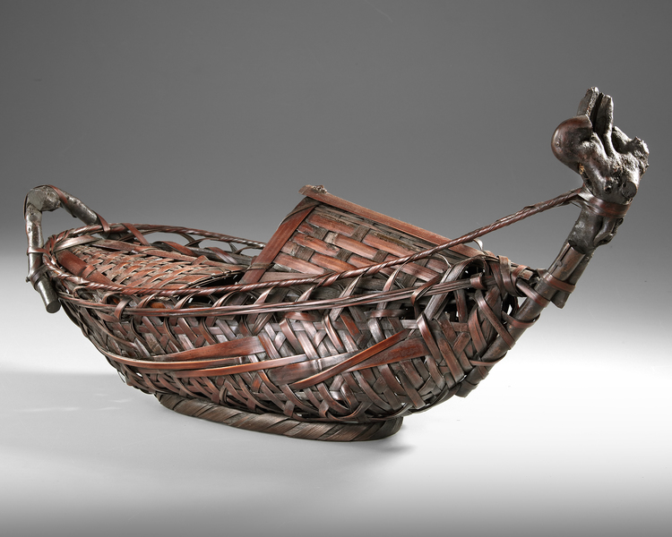 A JAPANESE IKEBANA BASKET IN THE SHAPE OF A BOAT, 20TH CENTURY