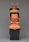 A RED LACQUER SUIT-OF-ARMOUR (YOROI), MID-SHOWA PERIOD