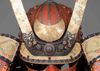 A RED LACQUER SUIT-OF-ARMOUR (YOROI), MID-SHOWA PERIOD