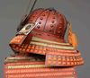 A RED LACQUER SUIT-OF-ARMOUR (YOROI), MID-SHOWA PERIOD