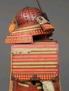 A RED LACQUER SUIT-OF-ARMOUR (YOROI), MID-SHOWA PERIOD