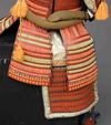 A RED LACQUER SUIT-OF-ARMOUR (YOROI), MID-SHOWA PERIOD