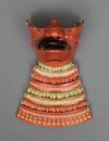 A RED LACQUER SUIT-OF-ARMOUR (YOROI), MID-SHOWA PERIOD
