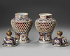 A PAIR OF JAPANESE OPENWORK IMARI JARS, 17TH CENTURY