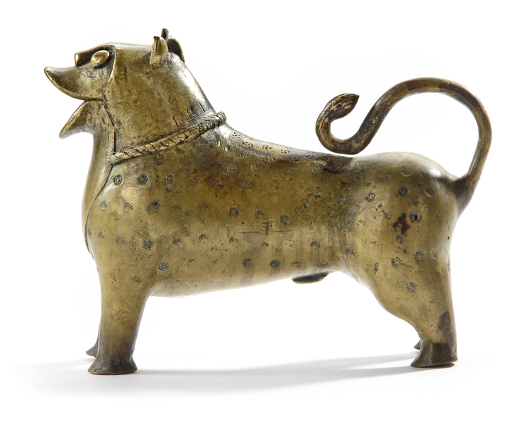 A MUGHAL BRASS INCENSE BURNER IN THE FORM OF A LION, INDIA, 17TH CENTURY