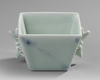 A CHINESE CELADON GLAZED CUP, 20TH CENTURY