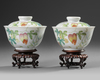 A PAIR OF CHINESE FAMILLE ROSE BOWLS AND COVERS, 19TH-20TH CENTURY