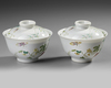 A PAIR OF CHINESE FAMILLE ROSE BOWLS AND COVERS, 19TH-20TH CENTURY