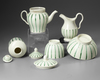 AN ENGLISH LATE 18TH / EARLY 19TH CENTURY GREEN STRIPED AND FLUTED CREAMWARE 5-PIECE TEA SERVICE